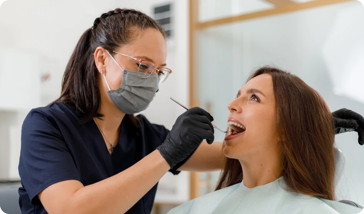 Woman receiving dental check-up