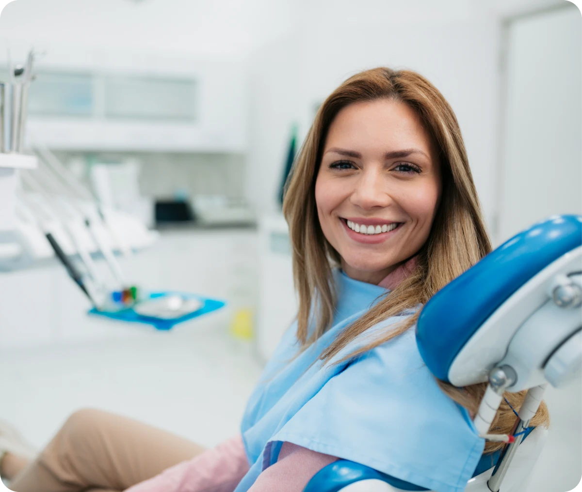 Happy patient at dentist's office