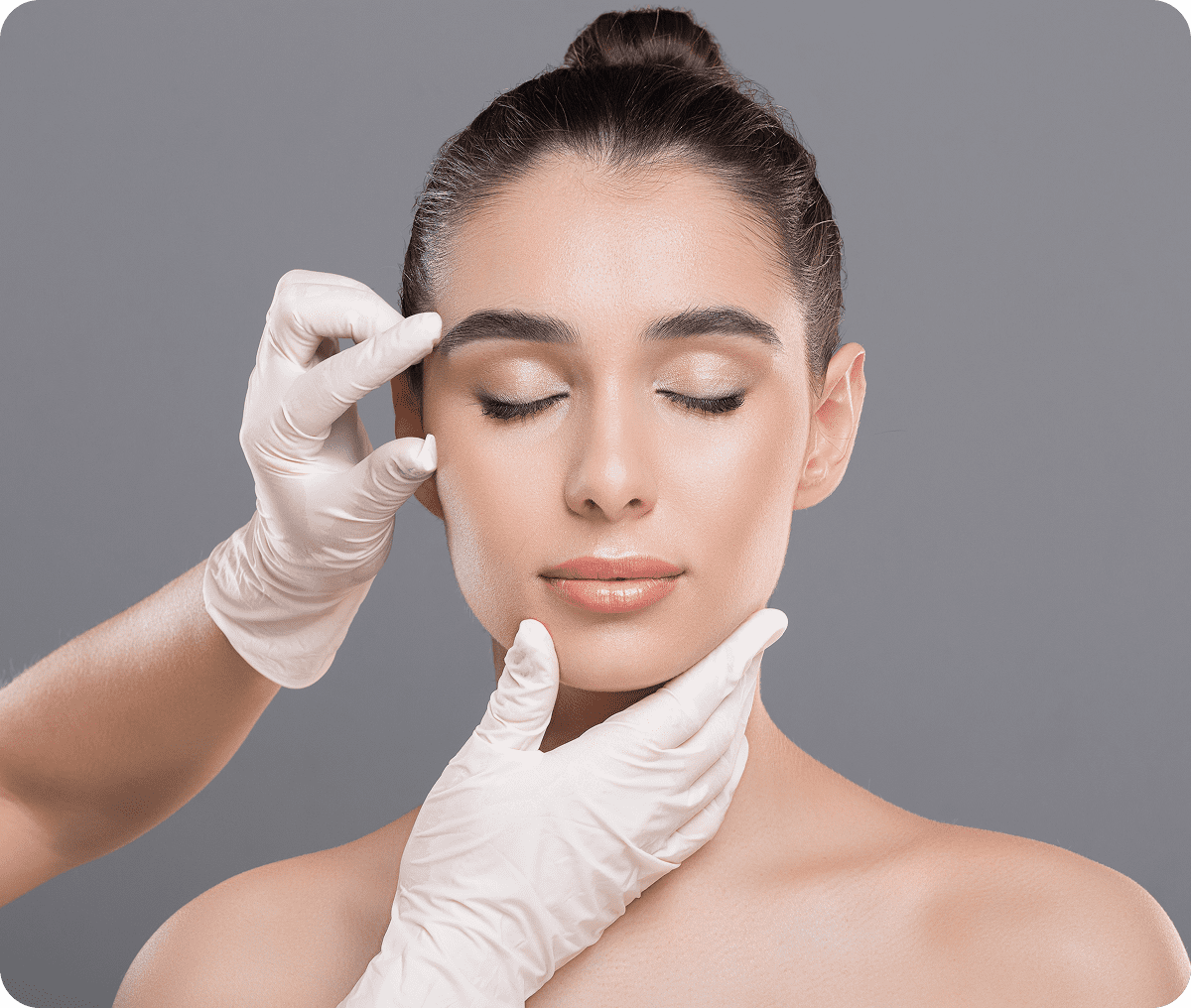 Woman receiving facial assessment